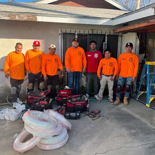 In-house G & W Plumbing crew on a repipe project